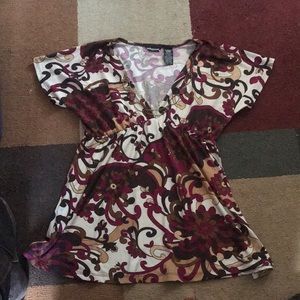 Women’s blouse with attached necklace